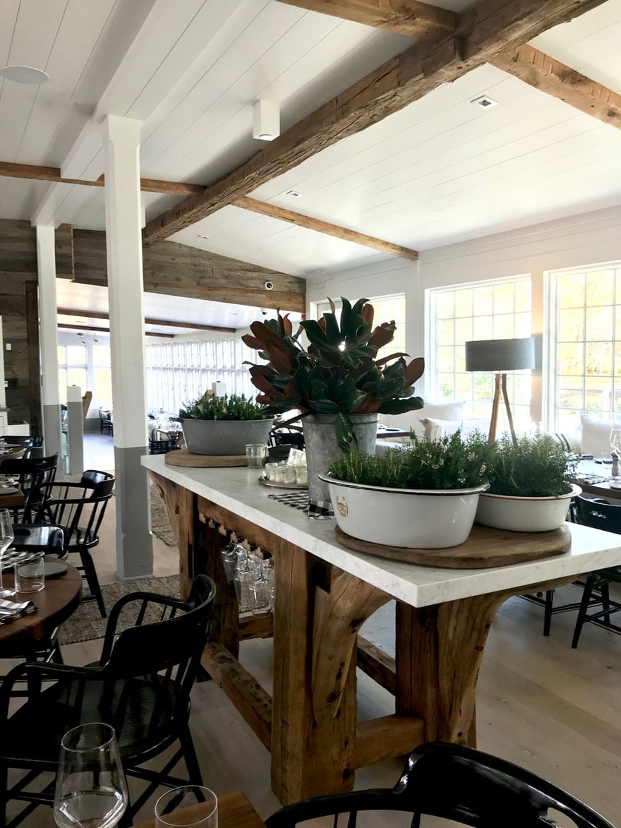 a lot of the furniture at GrayBarns was made on site with salvaged materials like this island in the center of the dining room