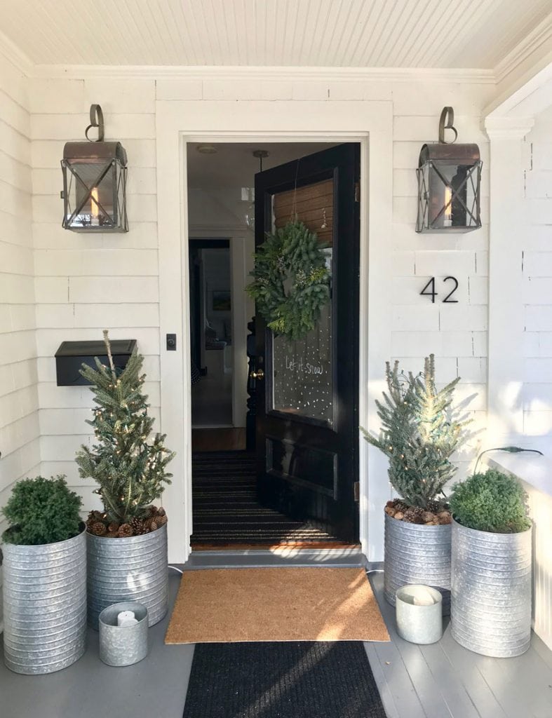 I love these planters from Rejuvination filled with Evergreens and pinecones