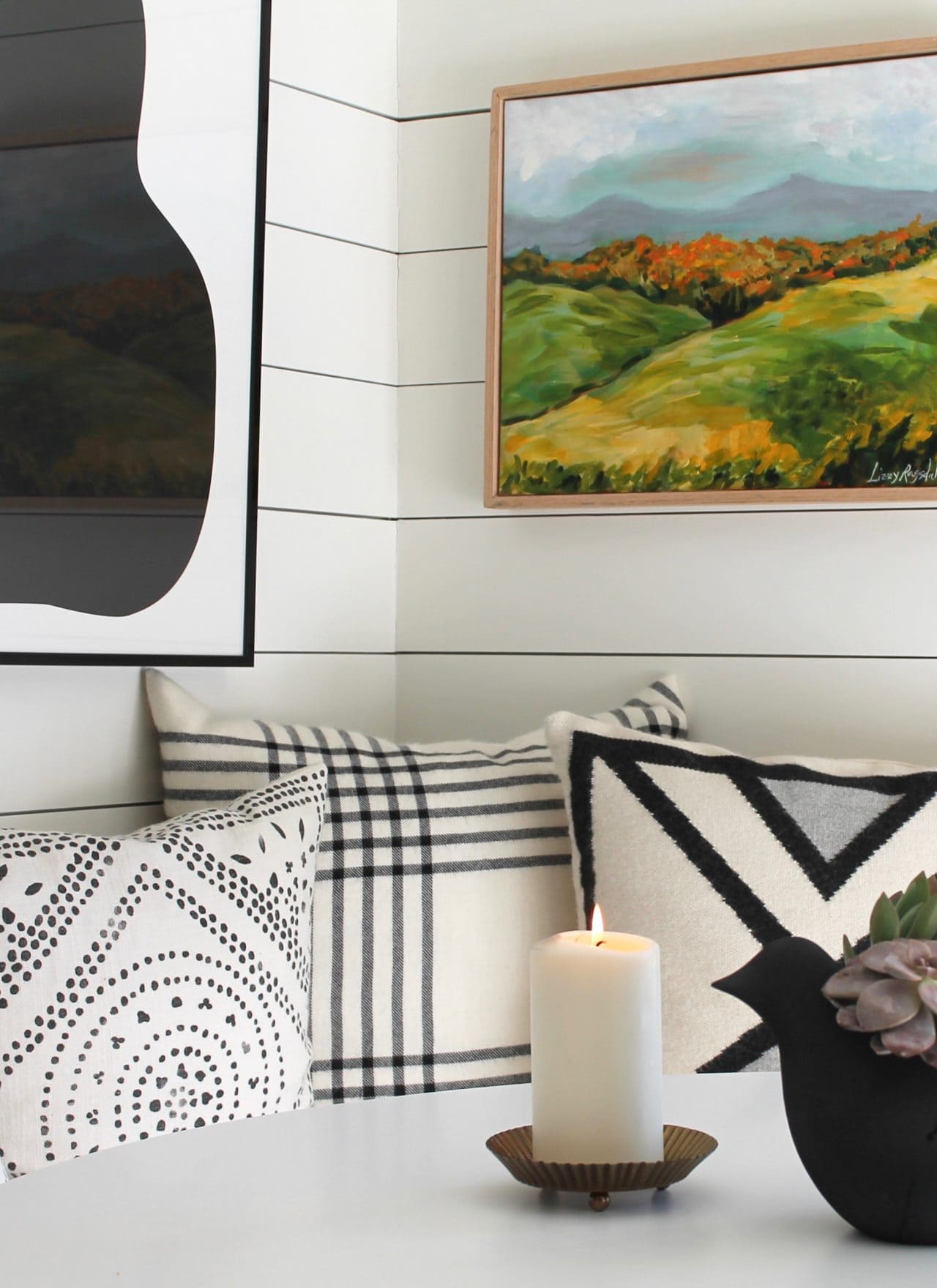 pillows, art, tabletop with planter