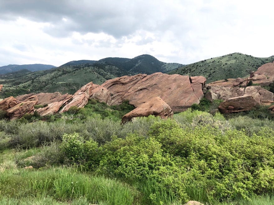 Red Rocks and green trees