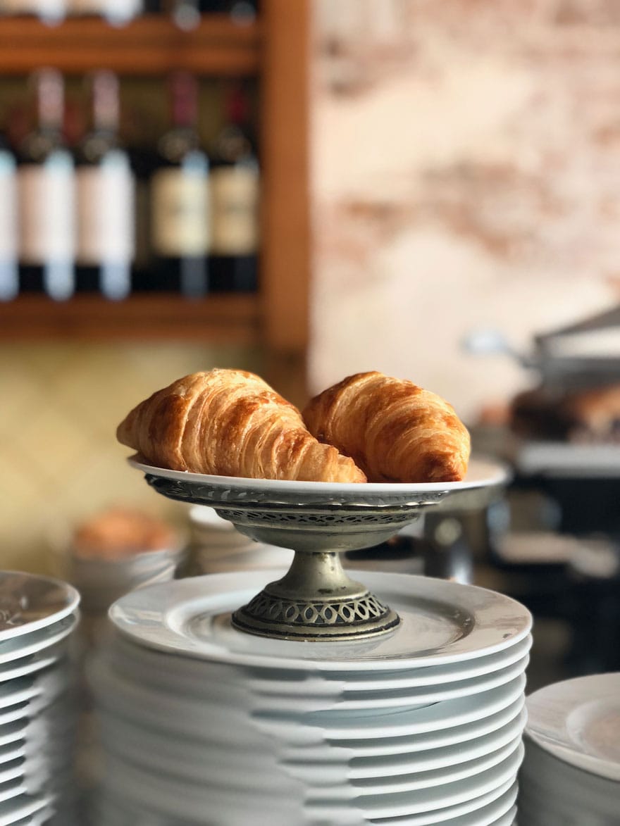 croissants on silver compote