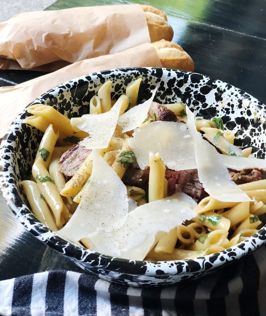 pasta salad in black and white bowl