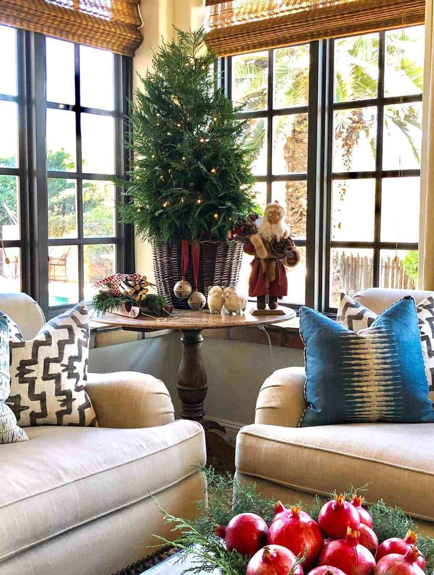 sofas, pillow and christmas tree on round table