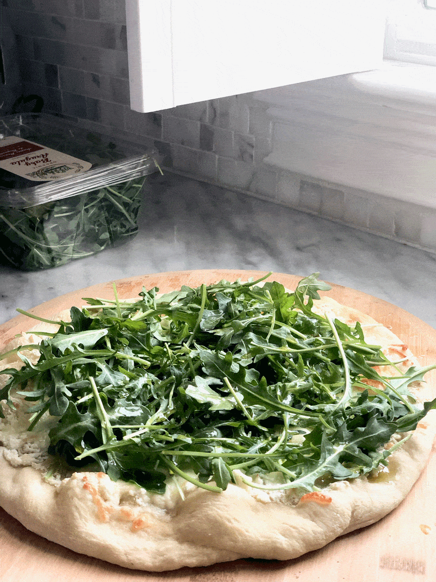 pizza salad, box of arugula 