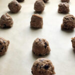 protein bites or balls on parchment paper
