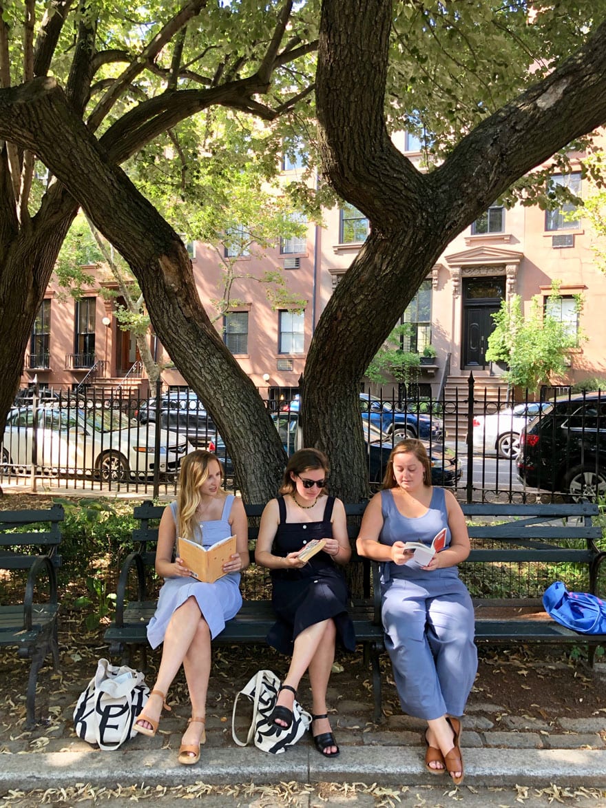 Three girls on park bench in Summer - Brooklyn, NY