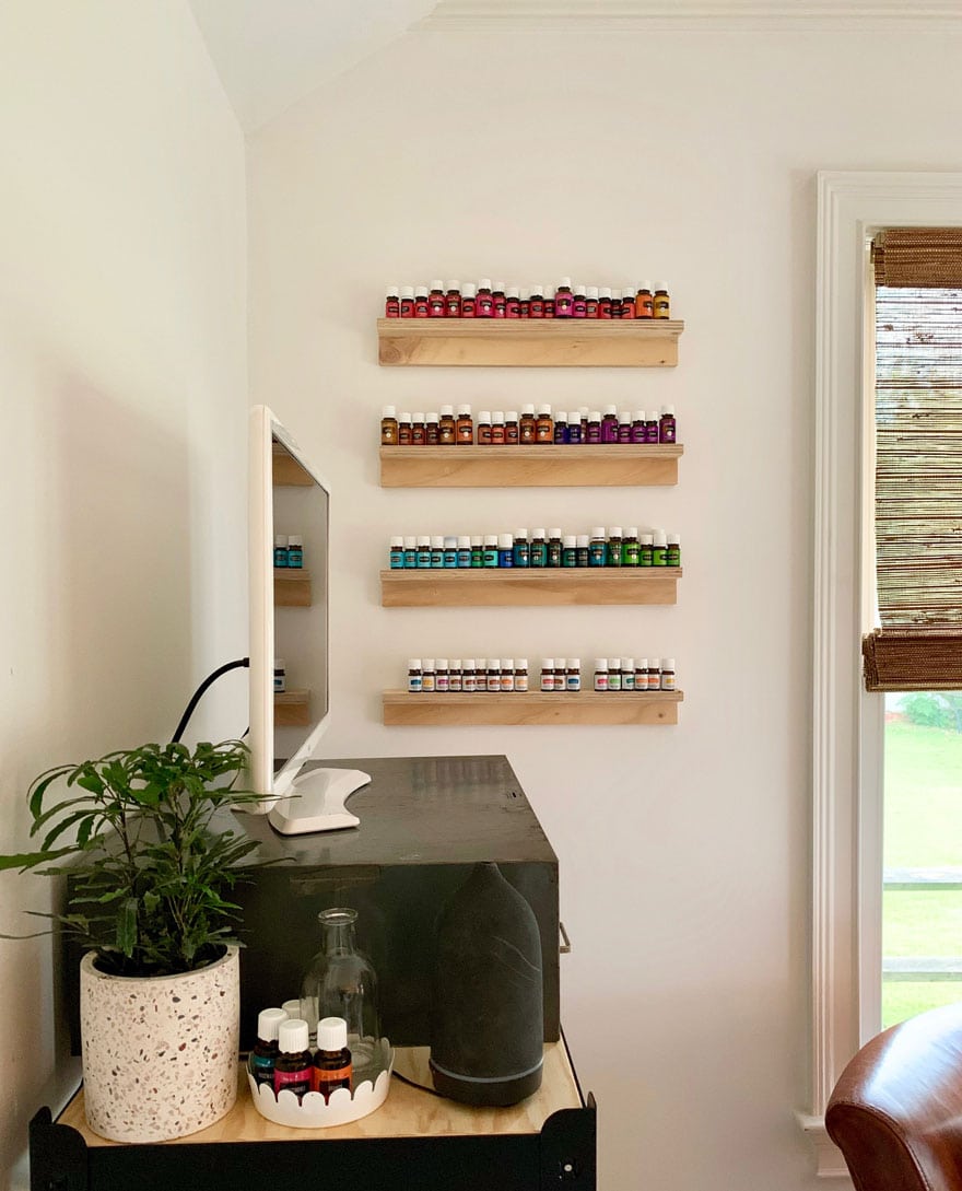 shelves with essential oil bottles