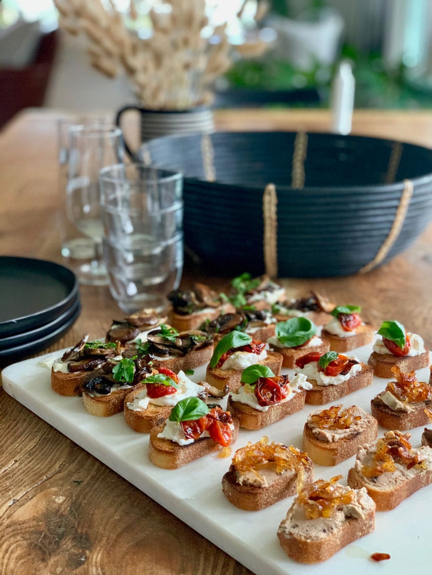 appetizer toasts on white board