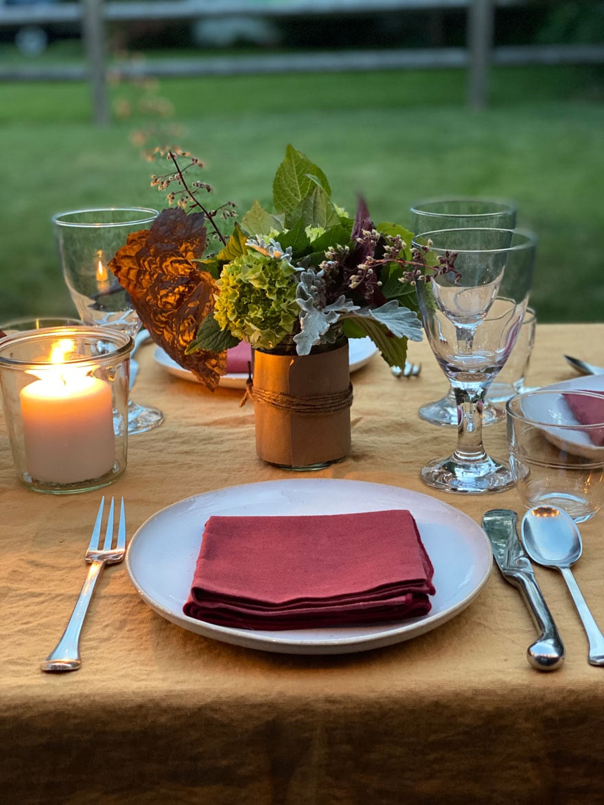 plate, napkin, candle, flowers