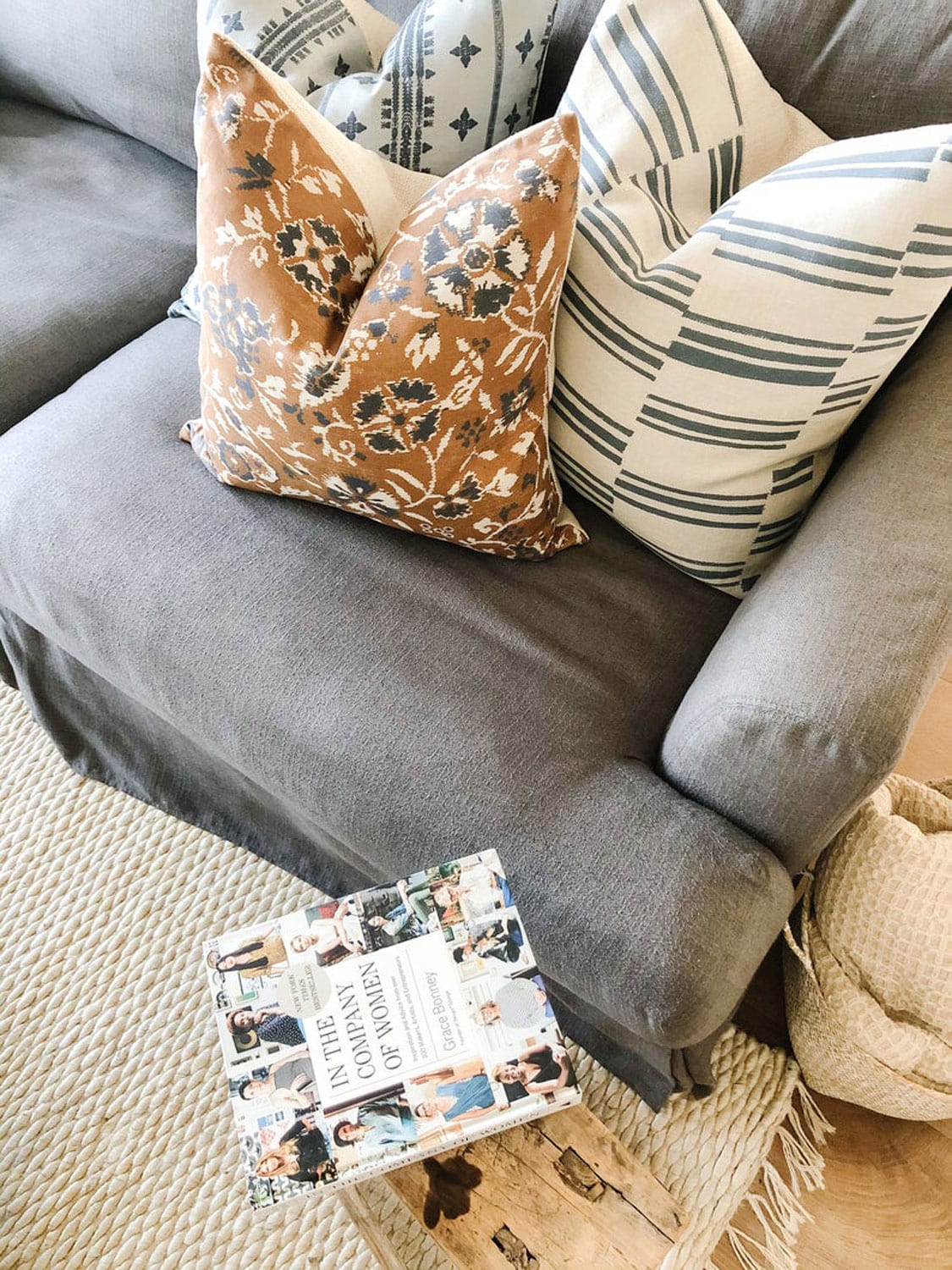 Pillows and book on soap and stool