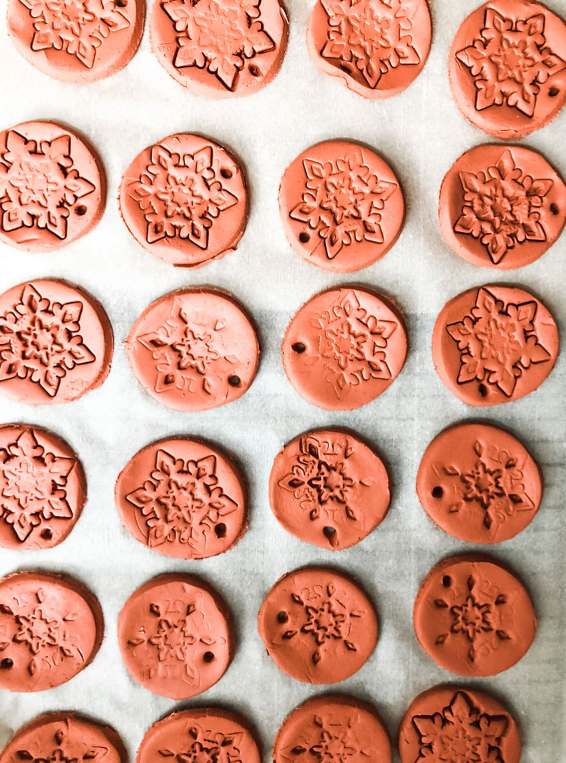 round terra-cotta clay diffuser tags with snowflake stamp