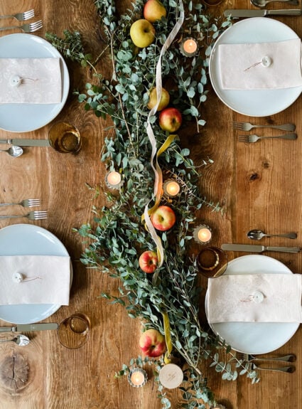 A Simple Thanksgiving table with Eucalyptus, apples & velvet