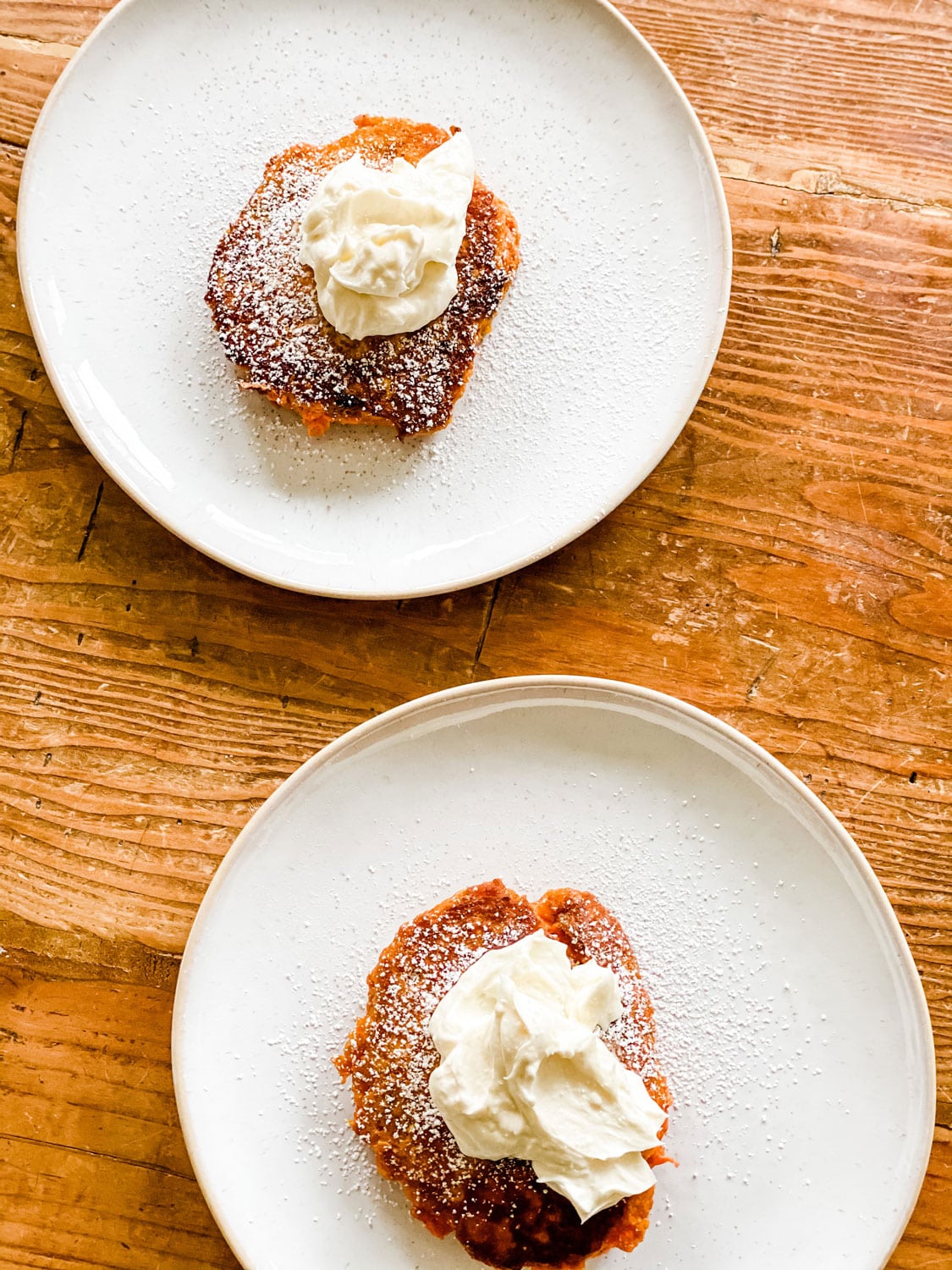 carrot cake pancake with cream cheese on plates