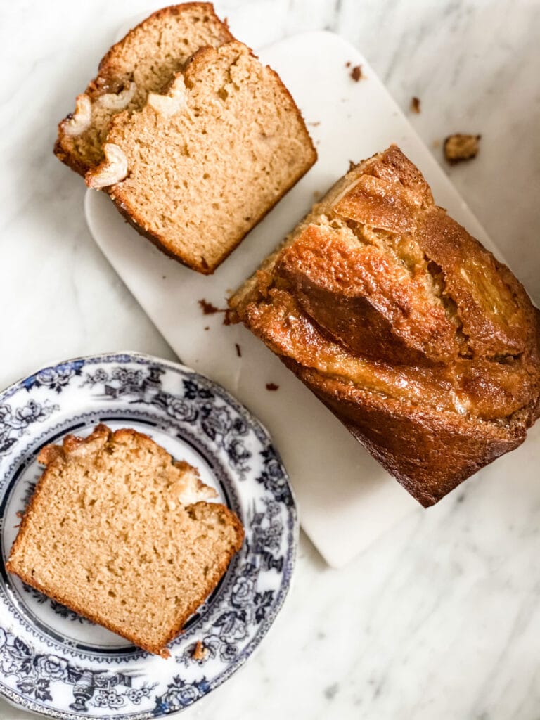 banana bread on black and white ironstone plate