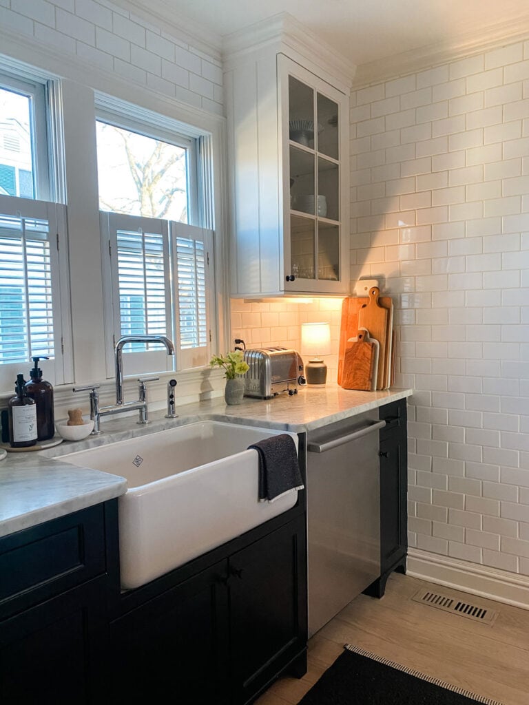 kitchen with black and white cabinets