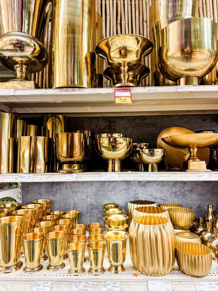 All different sizes and shapes of gold containers can be found at Jamali Floral and Garden.