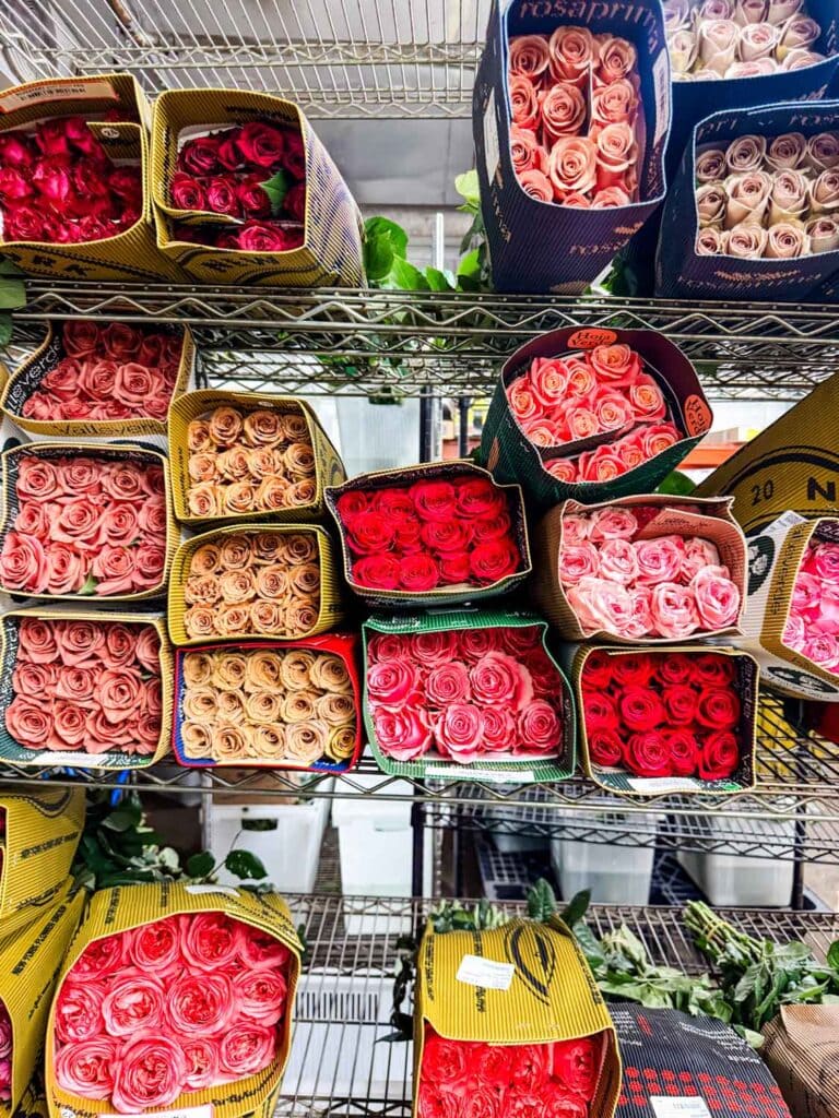 Dozens and dozens or different colored roses are always in stock at some stores at the NYC Flower Market.
