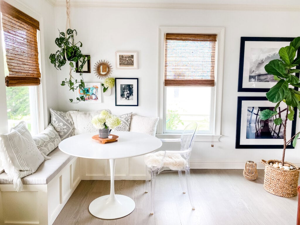 We built a custom banquette in an unused corner of the living room and combined with a round Saarinen table, it's a great place to hang out.