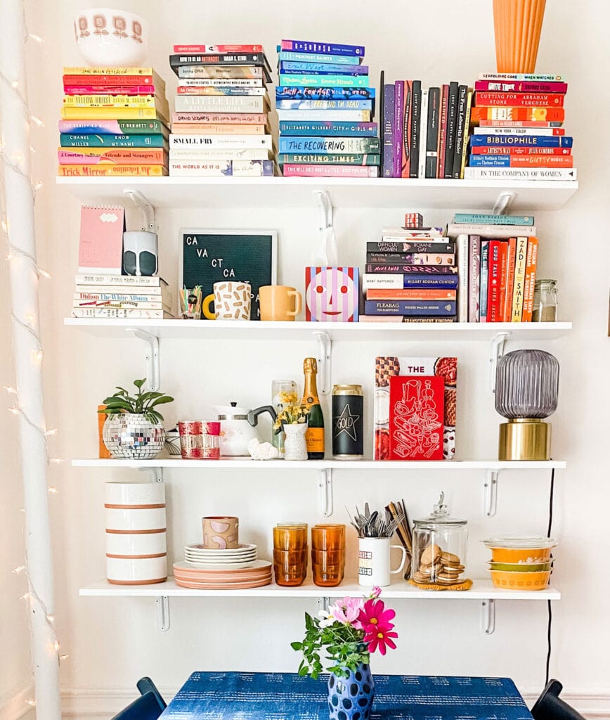 Open shelving for extra storage  has been installed in this studio apartment in Brooklyn, NY.