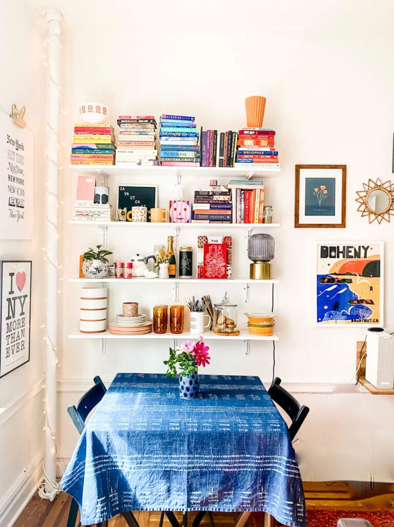 Open Shelving, part art, part necessity in this tiny studio apartment in Brooklyn, NY