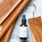 Make your own cedar spray with cedar essential oil to protect your wool and cashmere.