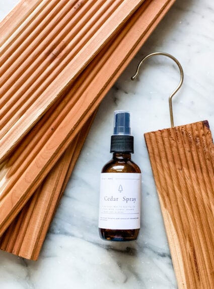 Make your own cedar spray with cedar essential oil to protect your wool and cashmere.