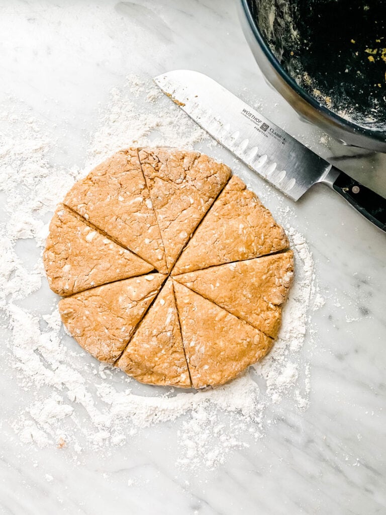 scone round cut into 8 parts with knife
