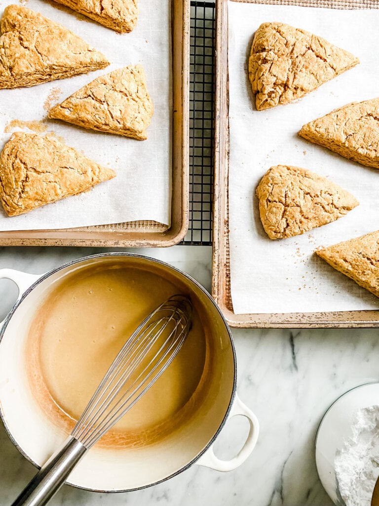 Let's put a maple glaze on the flakiest pumpkin scones, made with butter and maples syrup