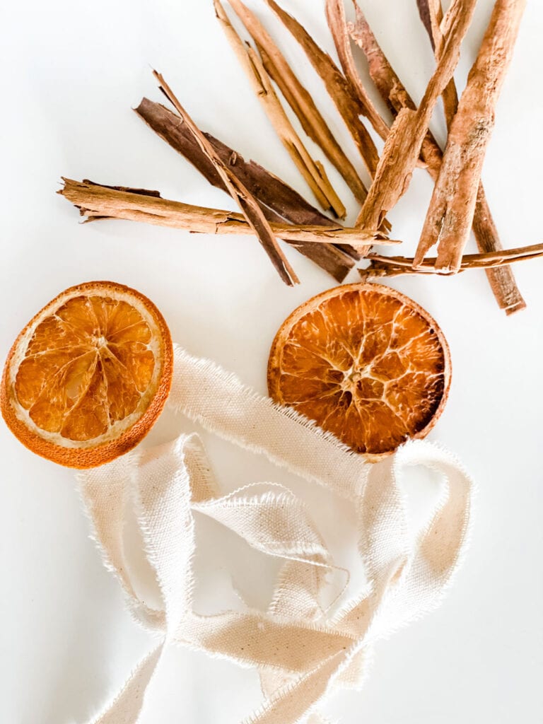 star garland with cinnamon sticks and dried orange slices
