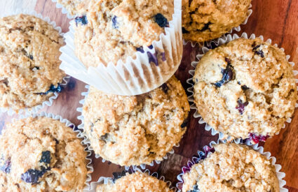 blueberry muffins in white paper muffin cups