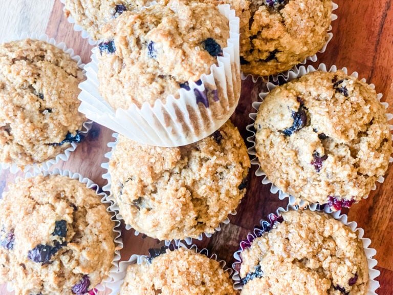 blueberry muffins in white paper muffin cups