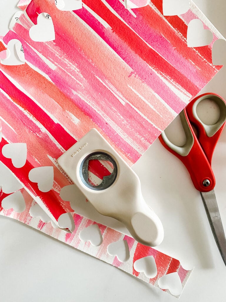 heart craft punch,. scissors, striped paper