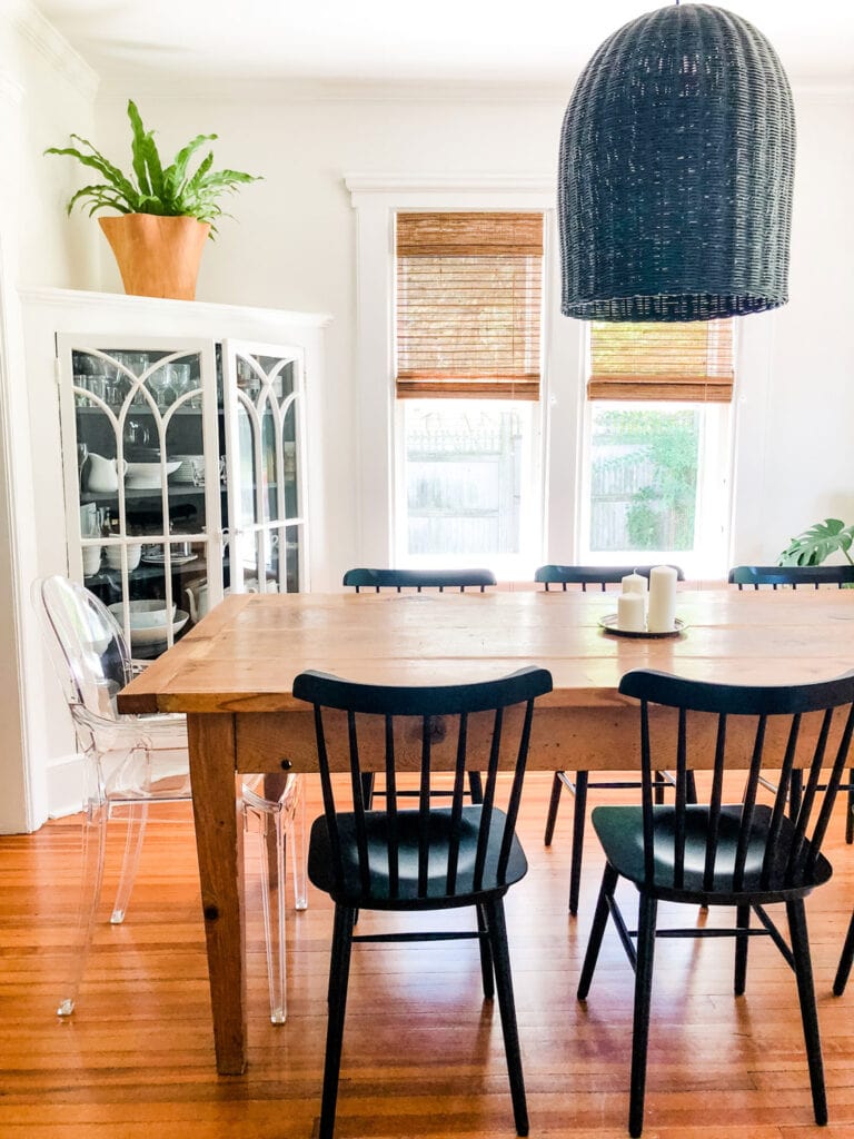 black dining chair and farm table 