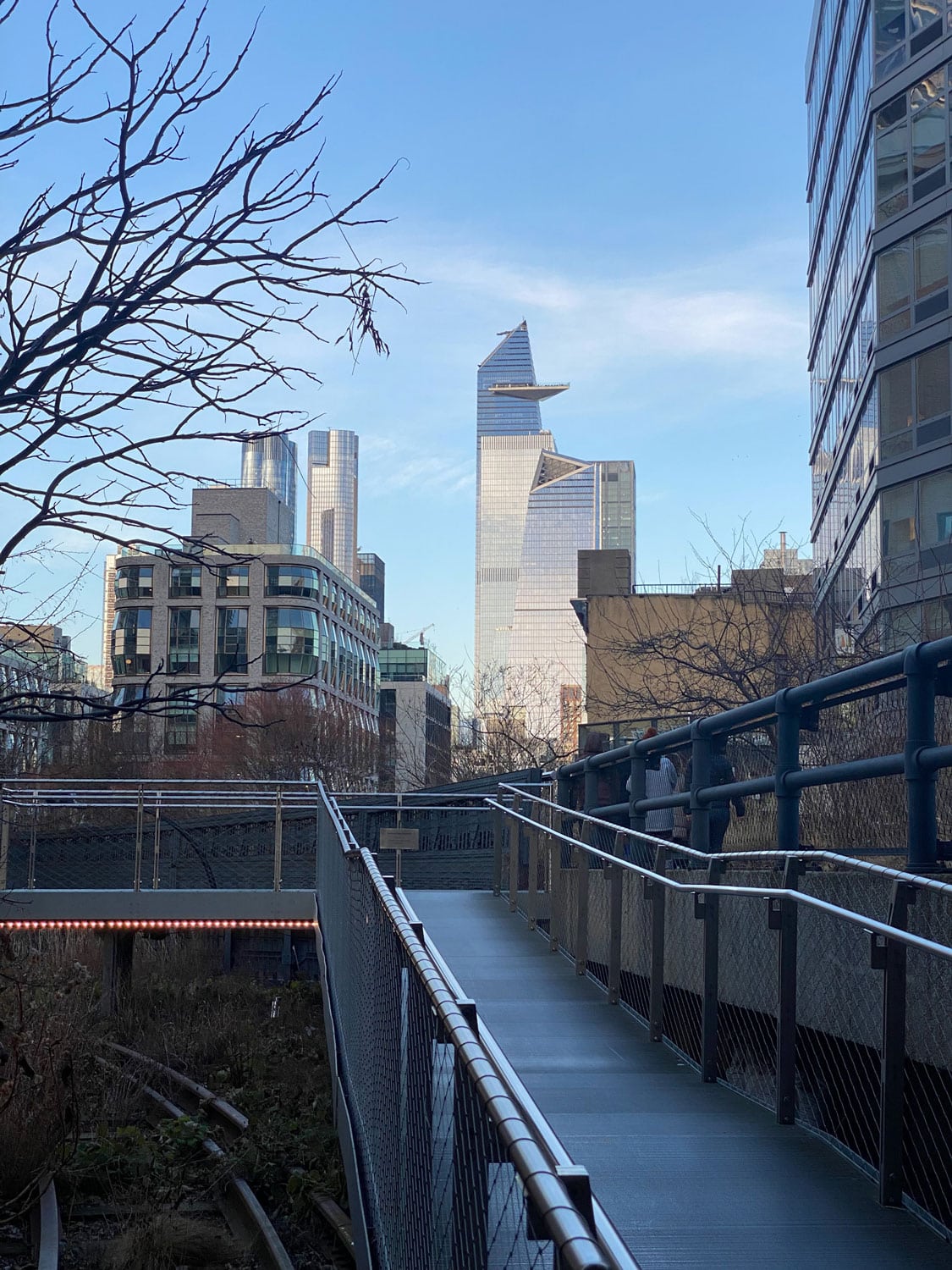 The view of The Edge building from the beautiful High Line in New York City end at the Vessel inn Hudson Yards