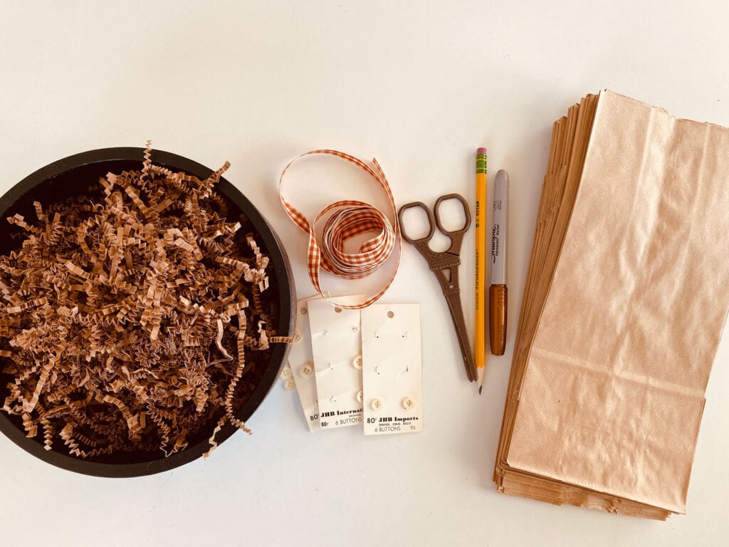 All the supplies you need for making a craft paper bag bunny for easter.