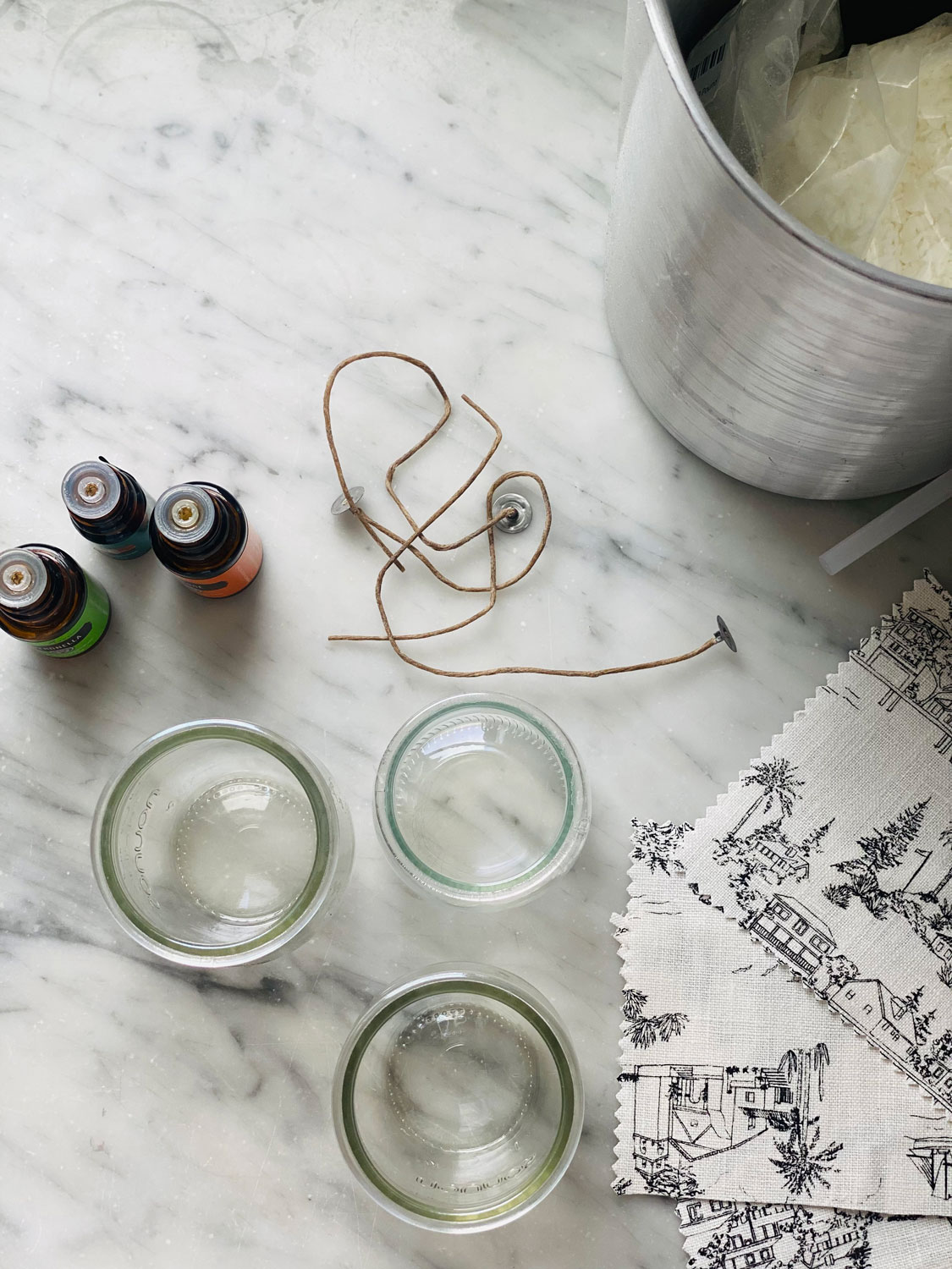 Minimal Candle Making Supplies on marble countertop