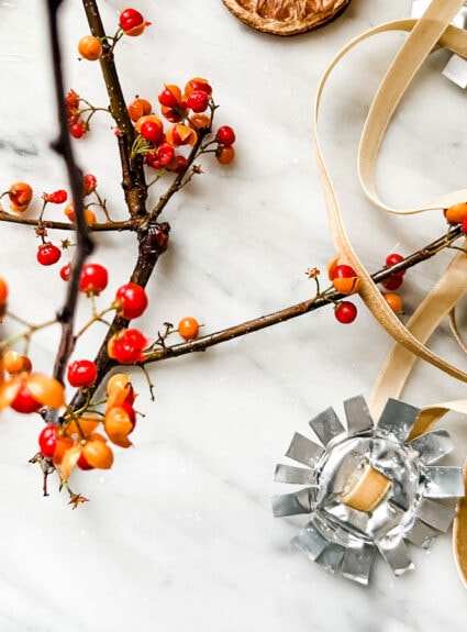 Make these simple ornaments from upcycled tea lights