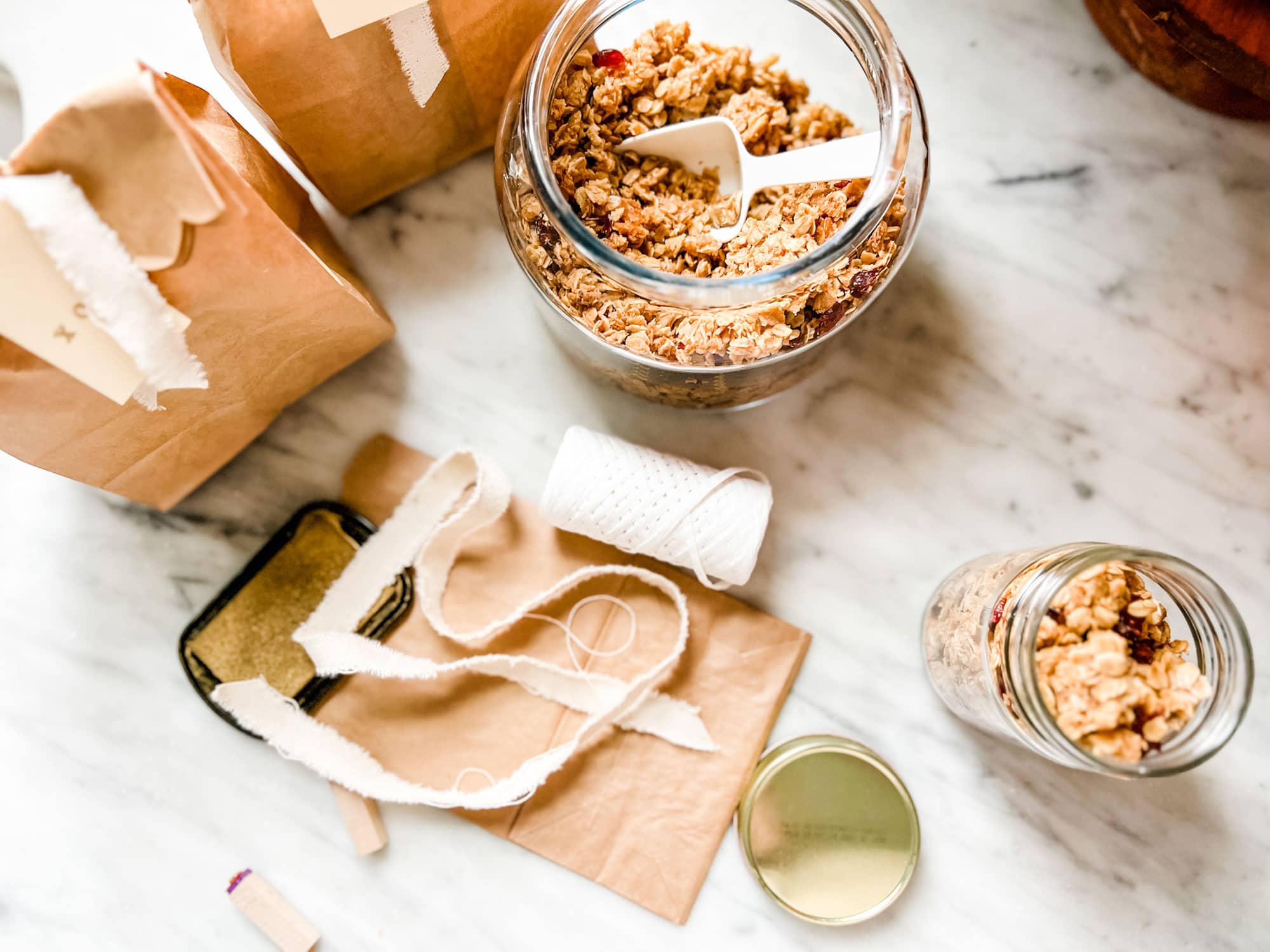 https://mostlovelythings.com/wp-content/uploads/2022/12/granola-in-jars-and-bags.jpg