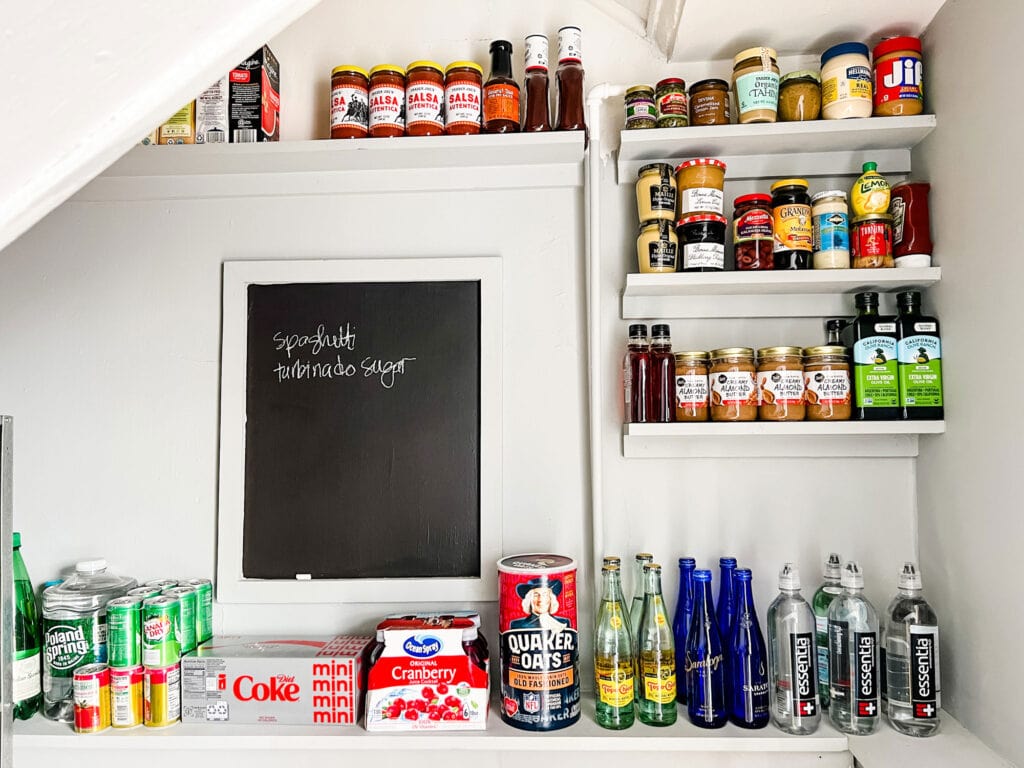 How to create a beautiful pantry in a small space. Include a chalkboard for grocery lists! 