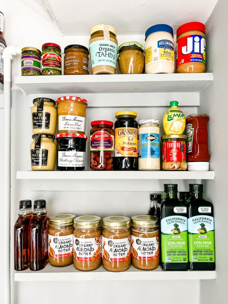 brightly colored bottle and jar labels on our pantry shelves