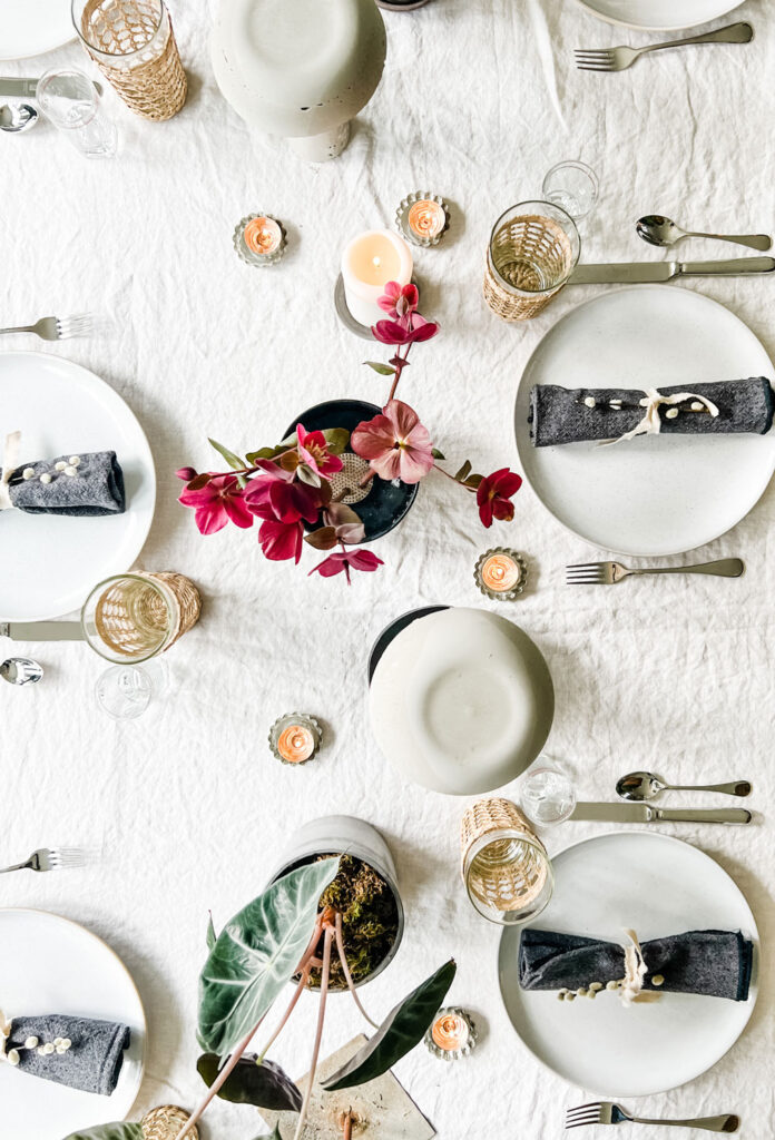 Concrete mushrooms are feature in this tablescape.