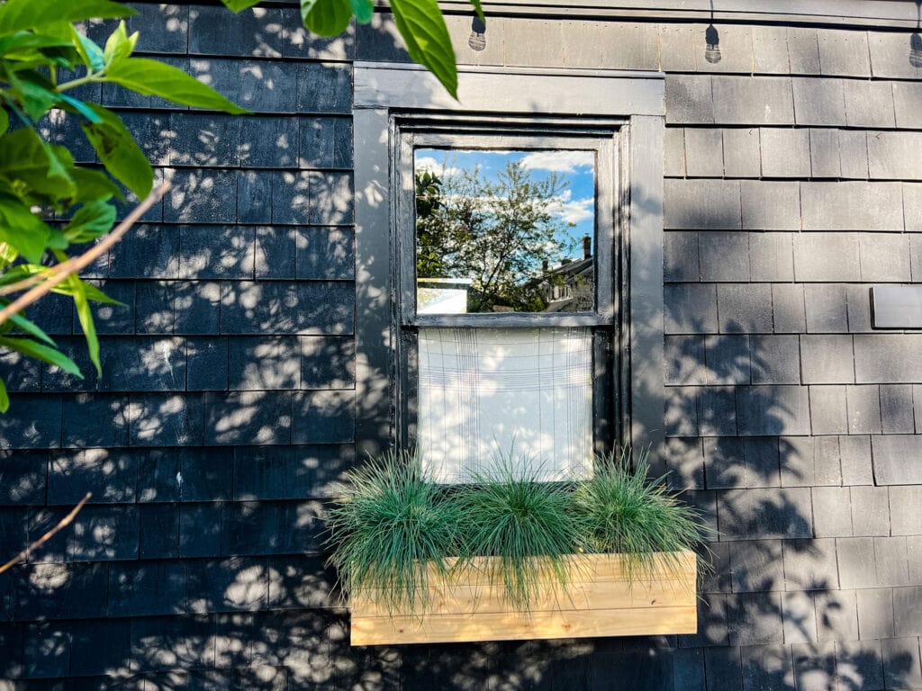 DIY Natural Wooden Window Box Planter on black garage