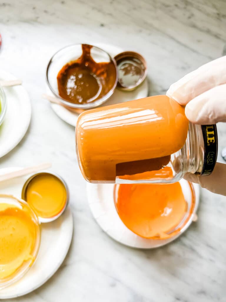 orange liquid in jar