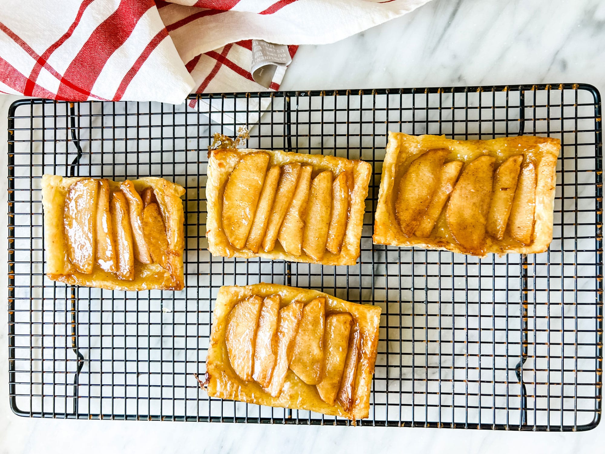 https://mostlovelythings.com/wp-content/uploads/2023/05/upside-down-apple-puff-pastry-tarts.jpg