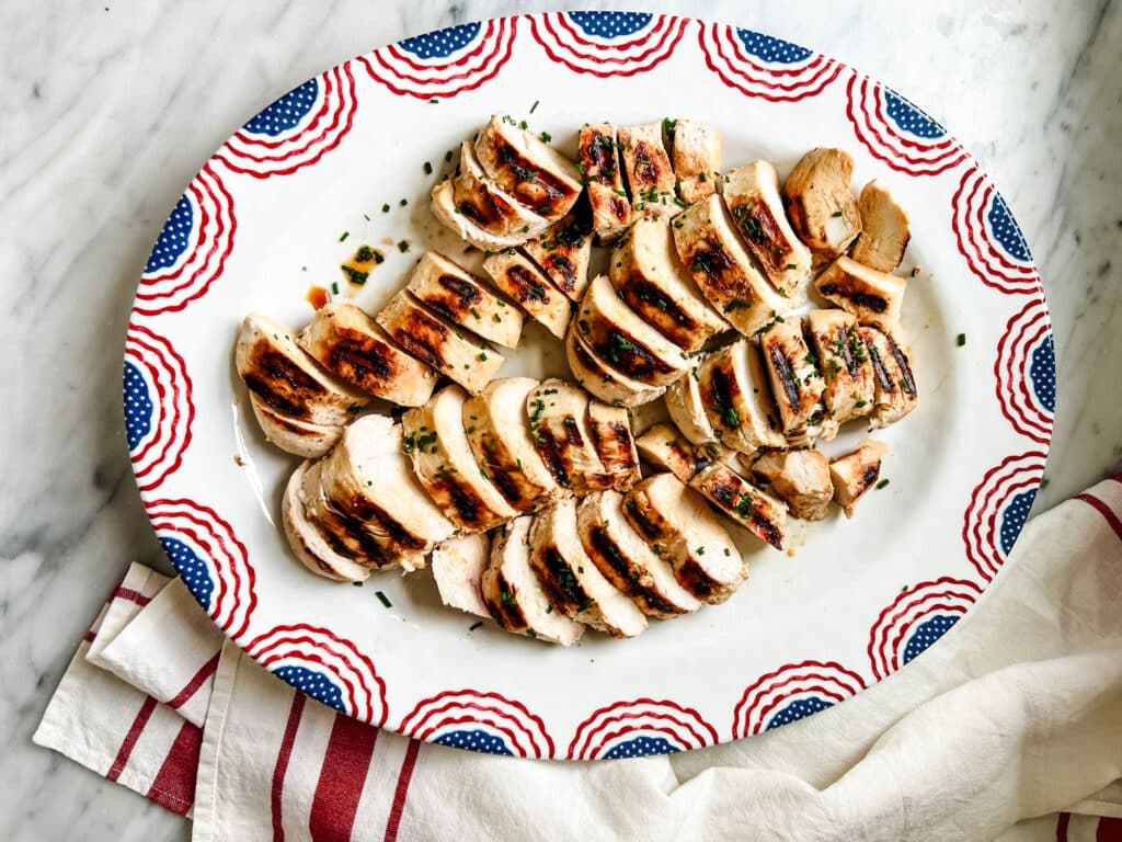 grilled chicken on Fourth of July USA flat platter on marble counter