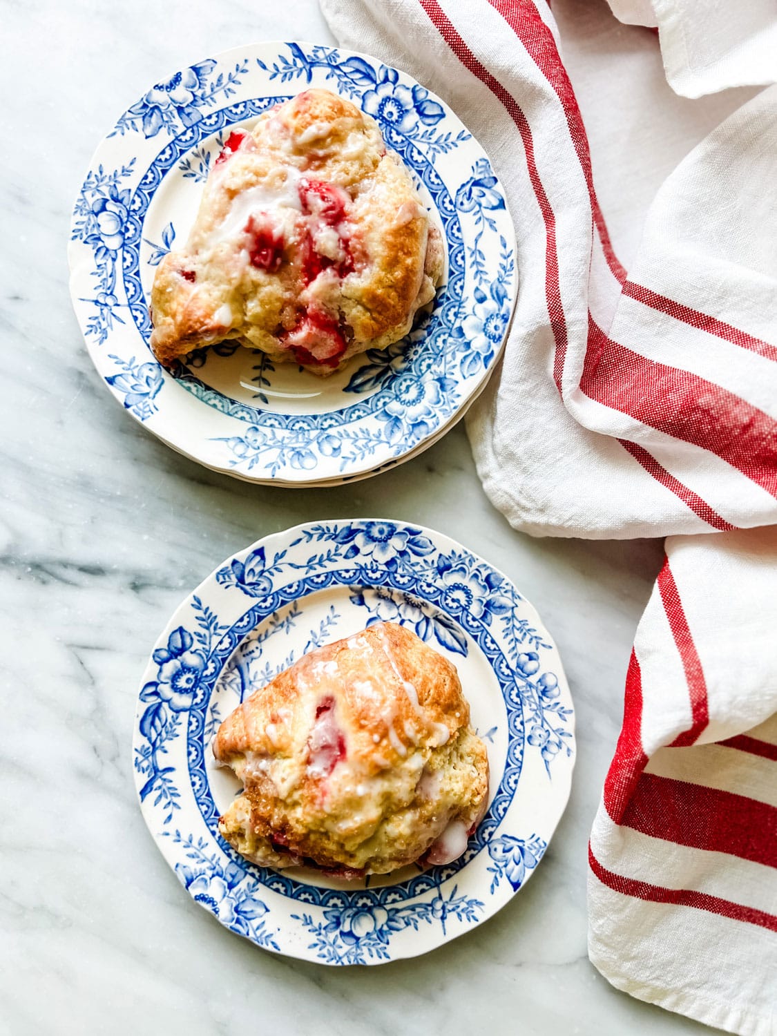 https://mostlovelythings.com/wp-content/uploads/2023/06/strawberry-scones-on-blue-and-white-plates.jpg