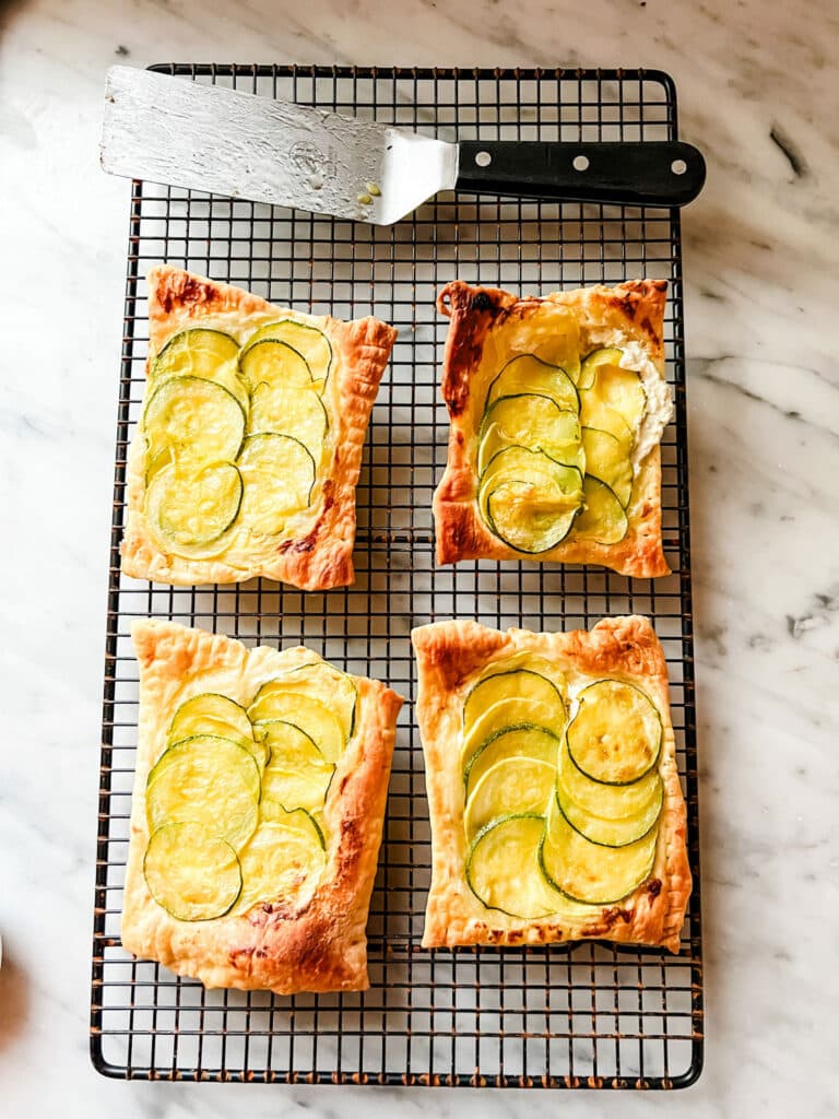 Ina Garten's Goat Cheese and Zucchini Tart on cooling rack