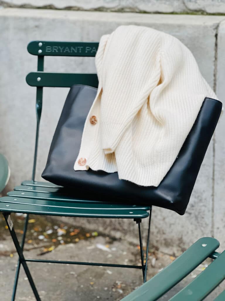 Italian Leather Tote Bag and this Mongolian Cashmere Oversized Boyfriend Cardigan Sweater on green cafe chair.