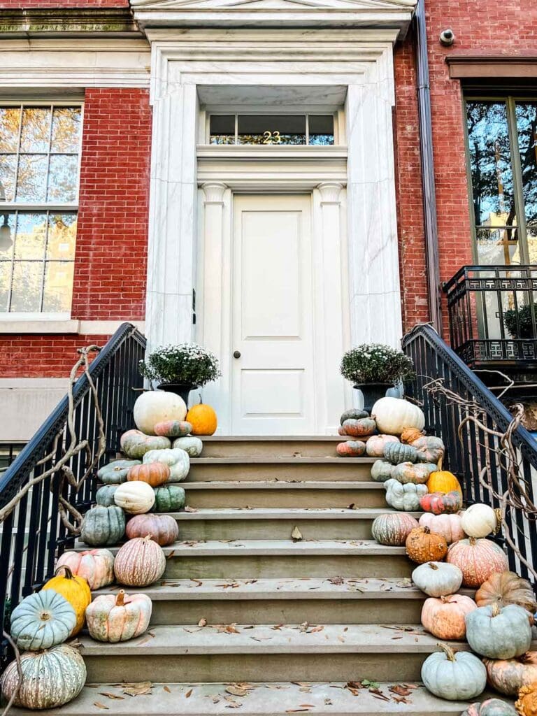 A stoop with fairytale pumpkins in New York City.