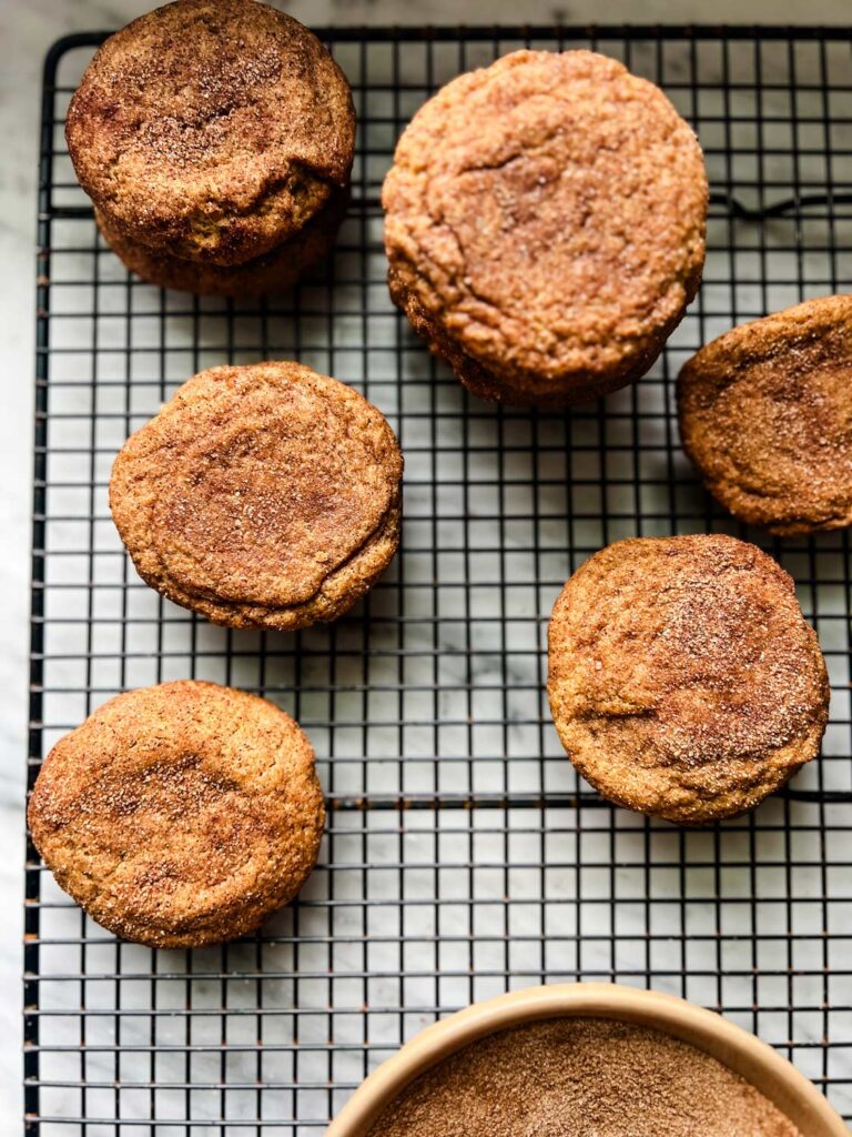 Warm Cookes are cooling on a wire rack.